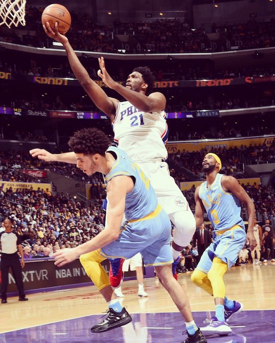 An overwhelming rush to the basket... (Philadelphia 76ers Joel Embiid vs. L.A. Lakers rookie Lonzo Ball)