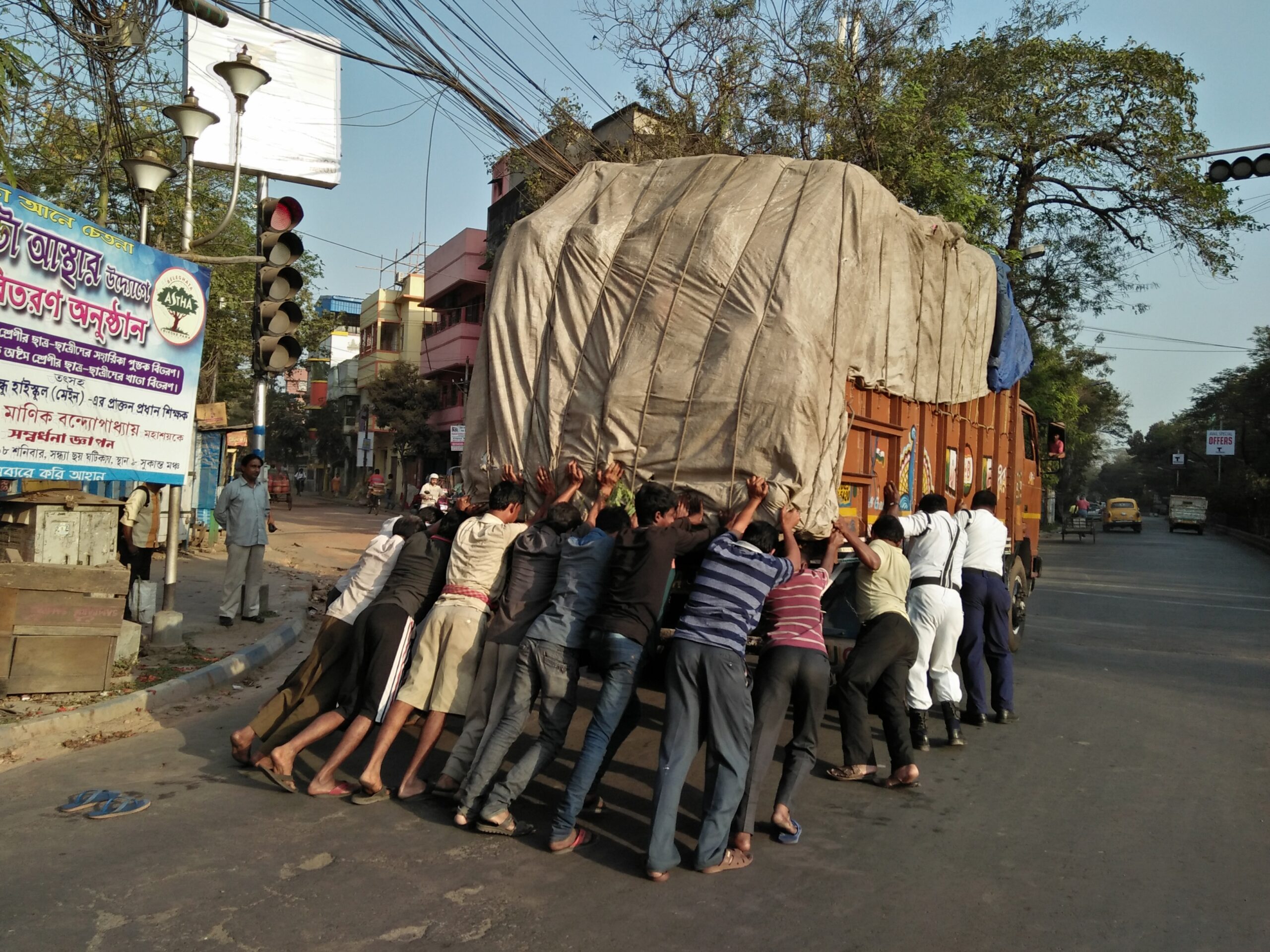 press the limits (Credit: Men Pushing Loaded Truck - Phulbagan - Kolkata 20180223161038 by Biswarup Ganguly on Flickr)